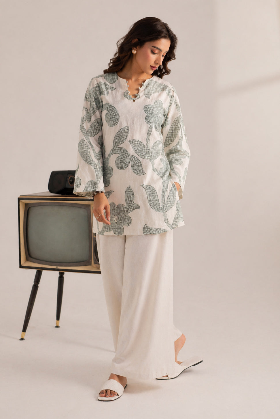 Laalzari sage green leaf print linen kurta for women — fabric detail