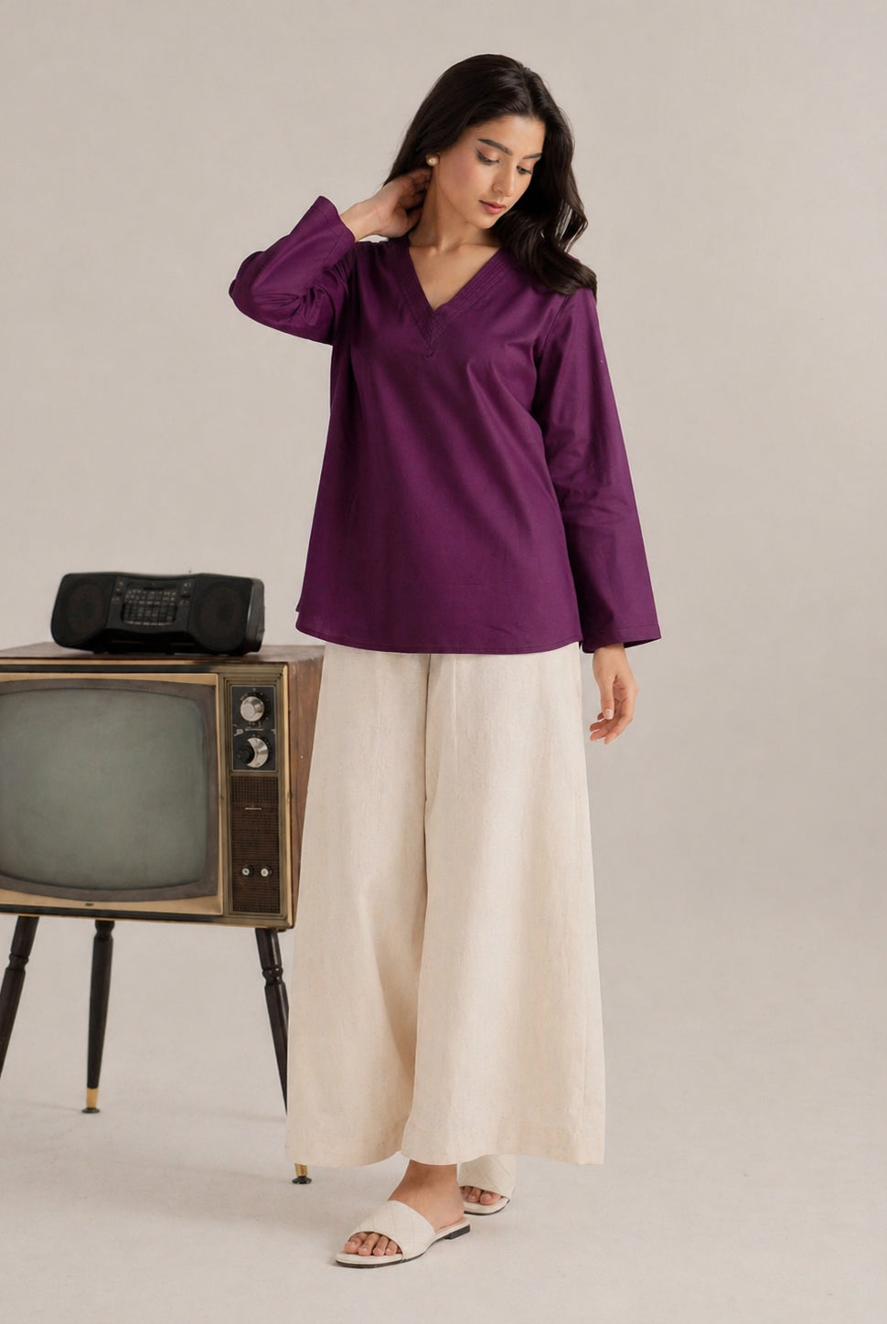 Laalzari royal plum V-neck linen kurta for women — front view