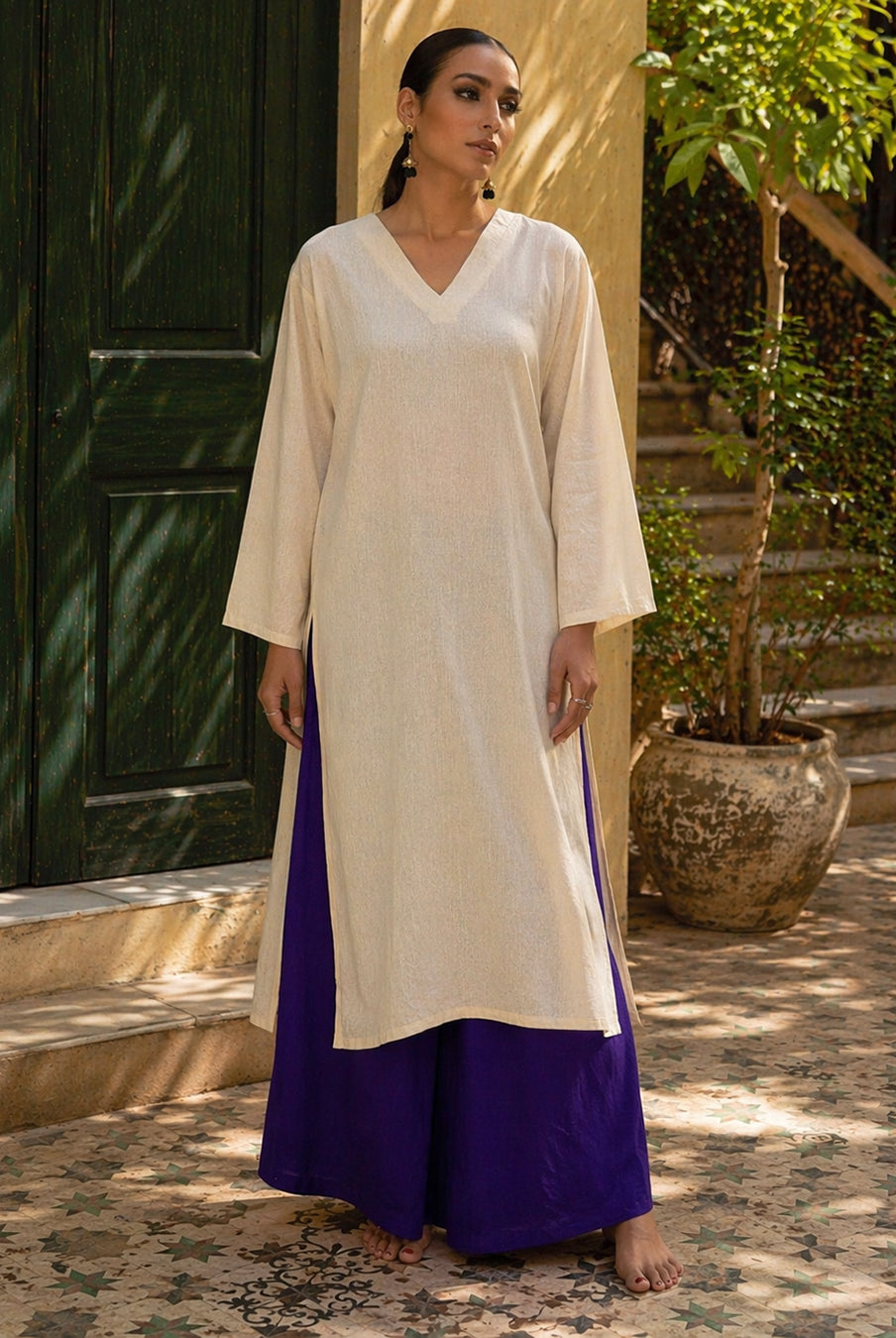 Laalzari ivory linen V-neck kurta and wide-leg palazzo co-ord set for women — front view