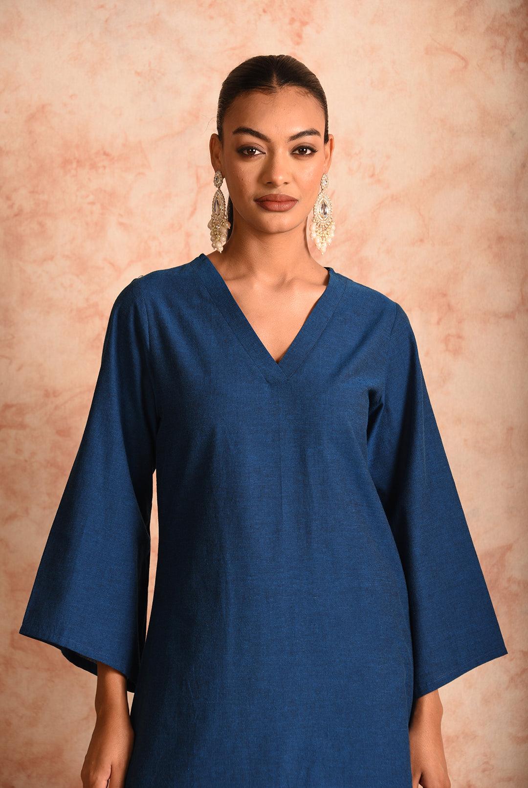 Laalzari solid blue V-neck linen kurta for women — full-length view