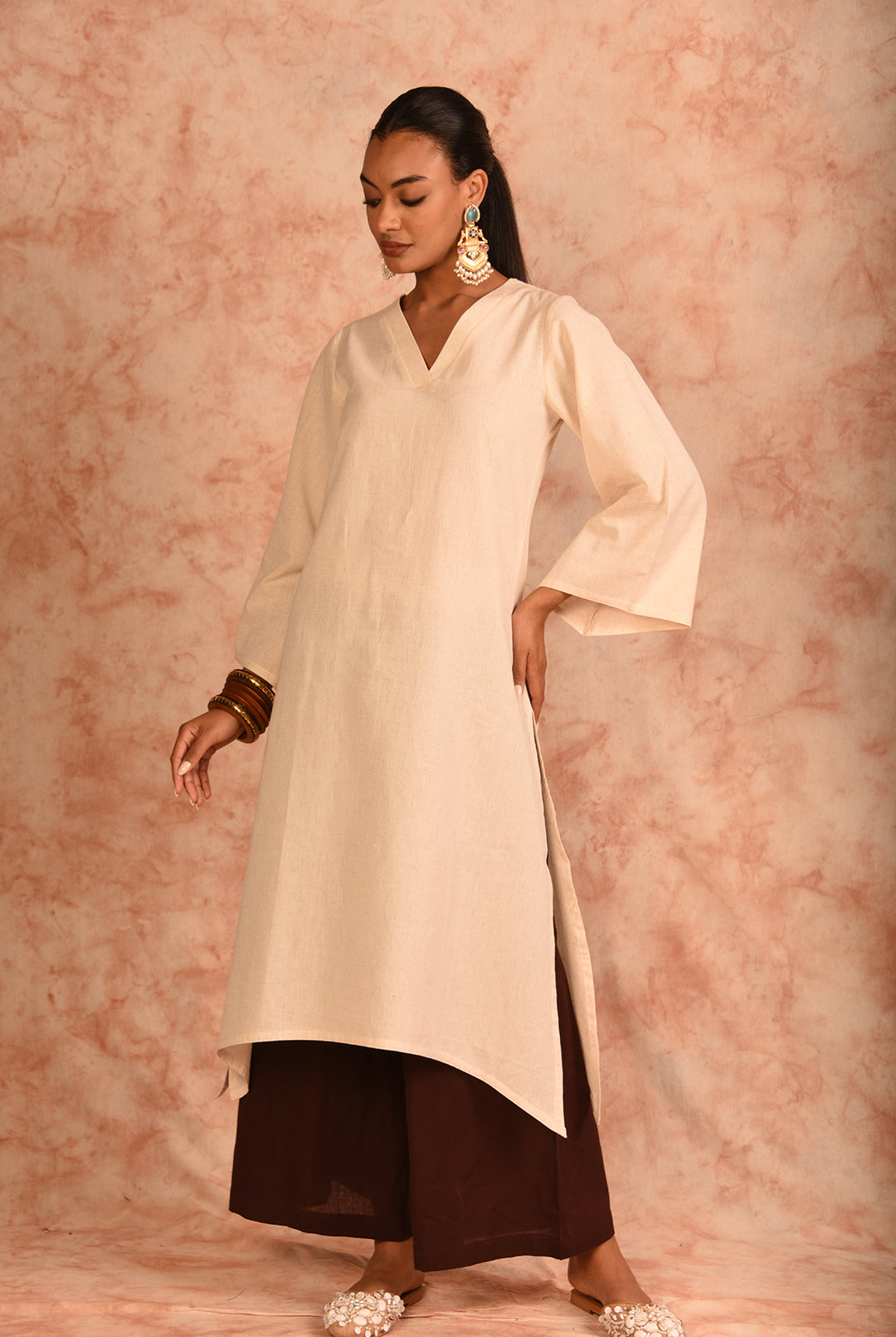 Laalzari off-white V-neck linen kurta for women — front view