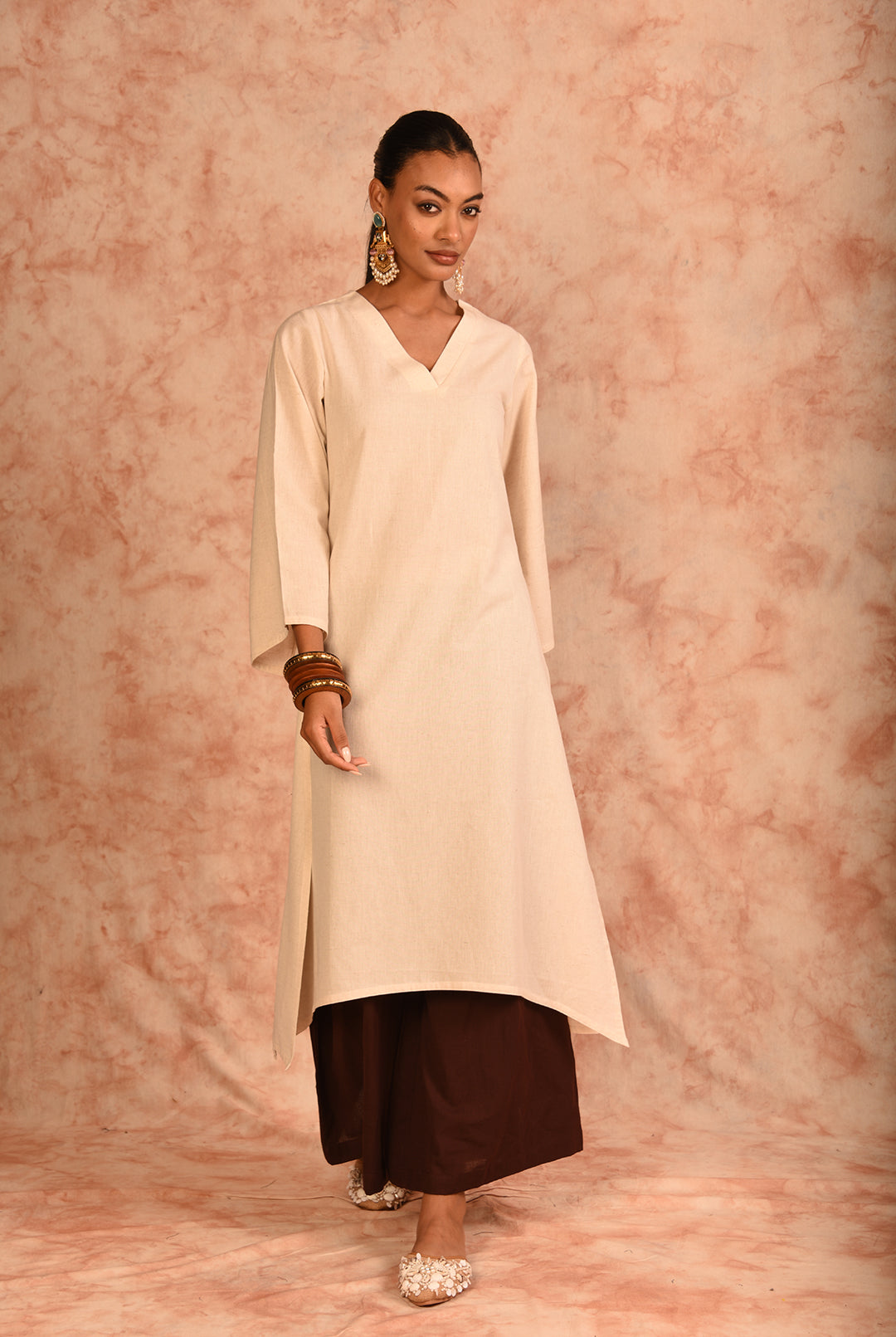 Laalzari off-white V-neck linen kurta for women — styled look