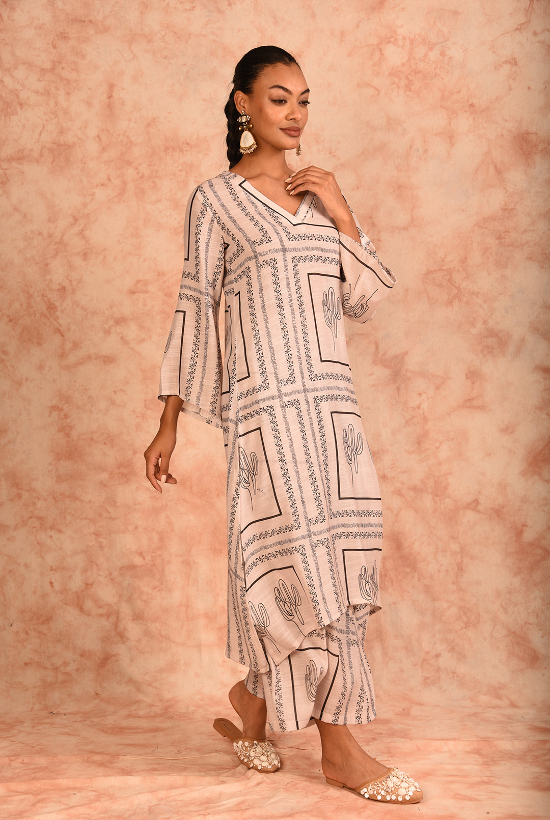 Laalzari off-white printed linen kurta and palazzo co-ord set for women — back view