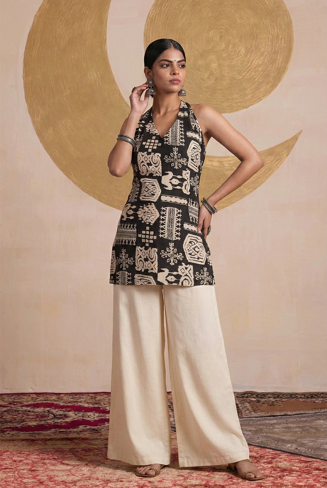 Laalzari black tribal print sleeveless tunic for women — front view