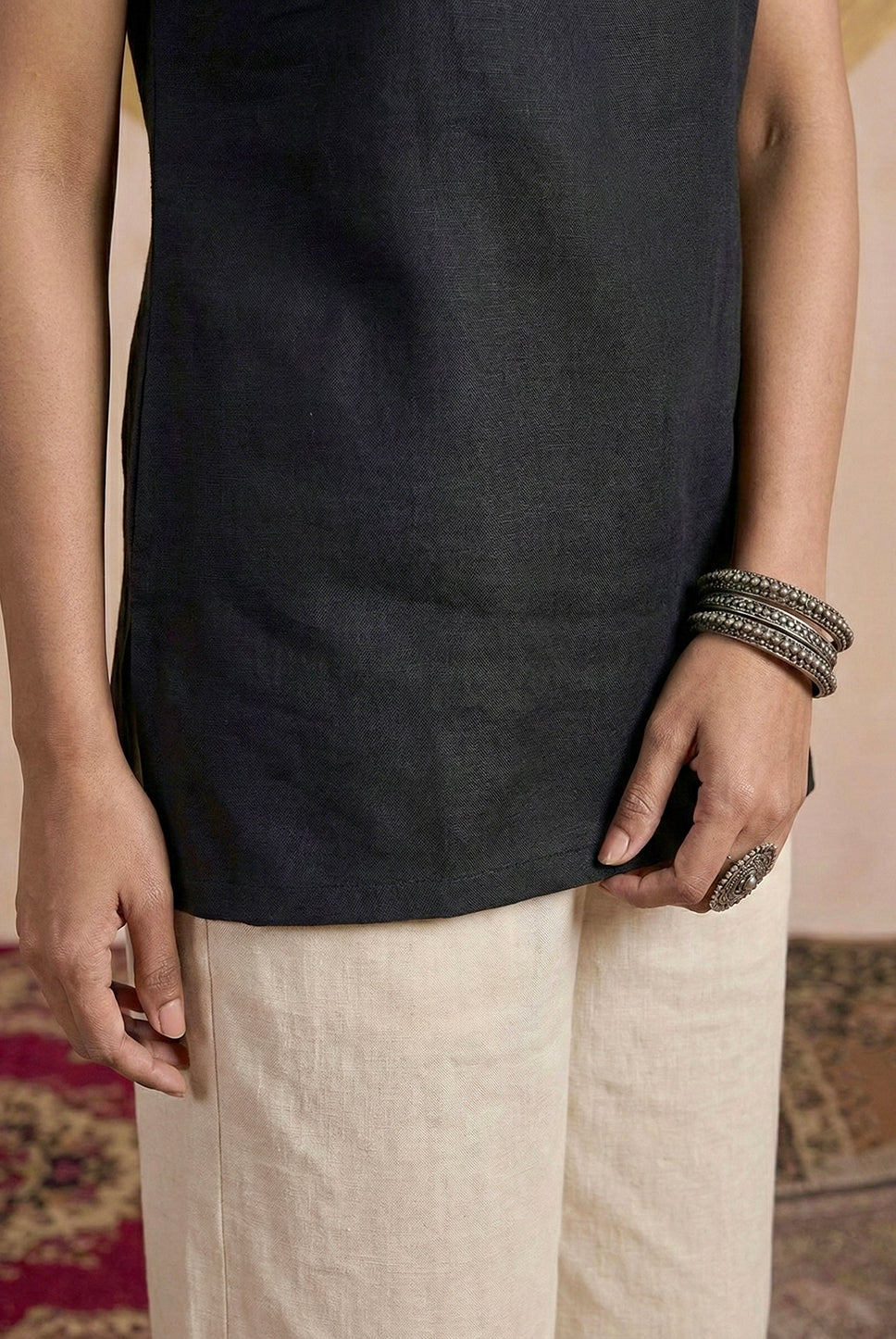 Laalzari midnight black V-neck sleeveless linen kurta for women — styled look