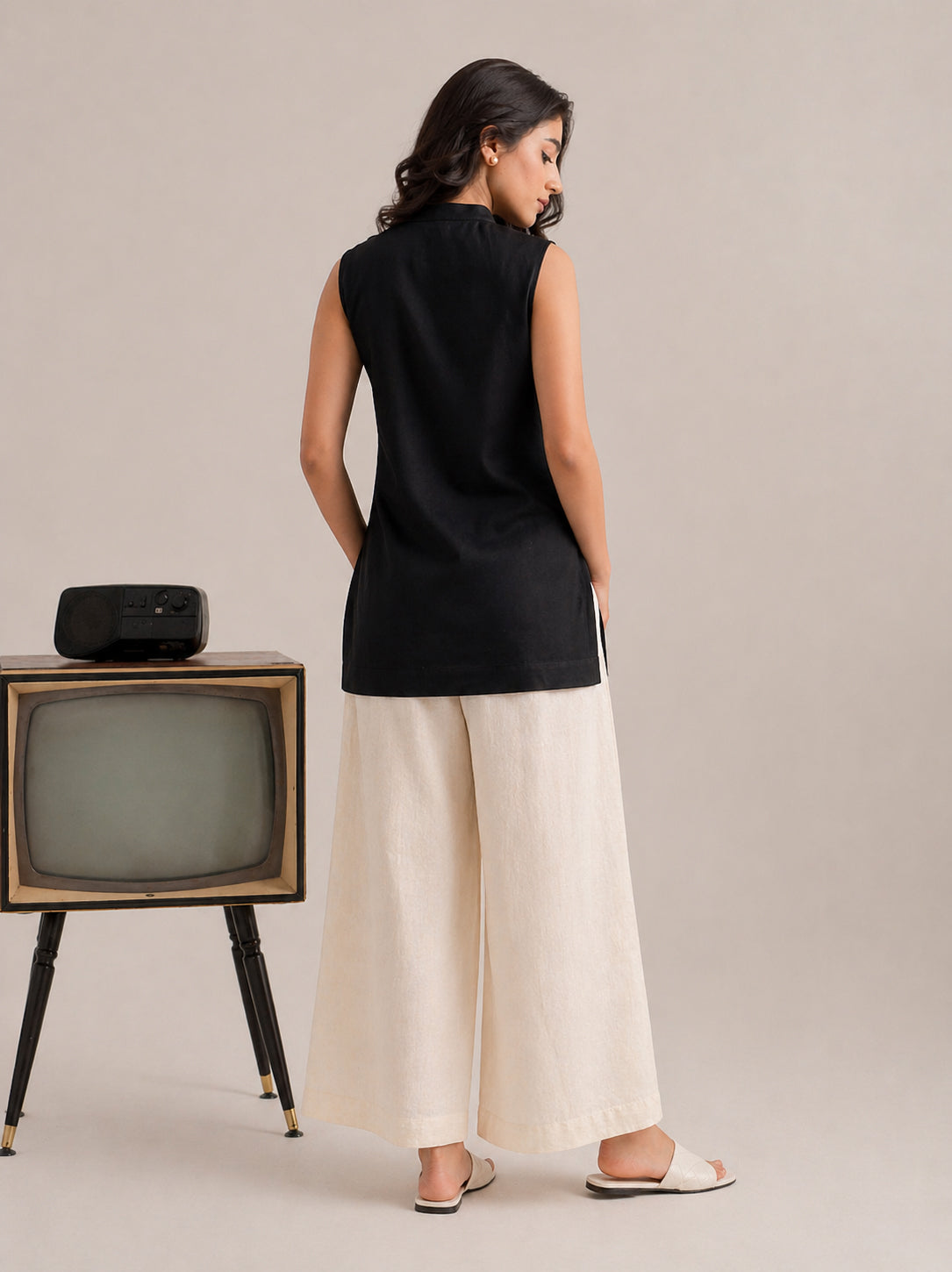 Laalzari midnight black sleeveless linen kurta and off-white palazzo set for women — styled look