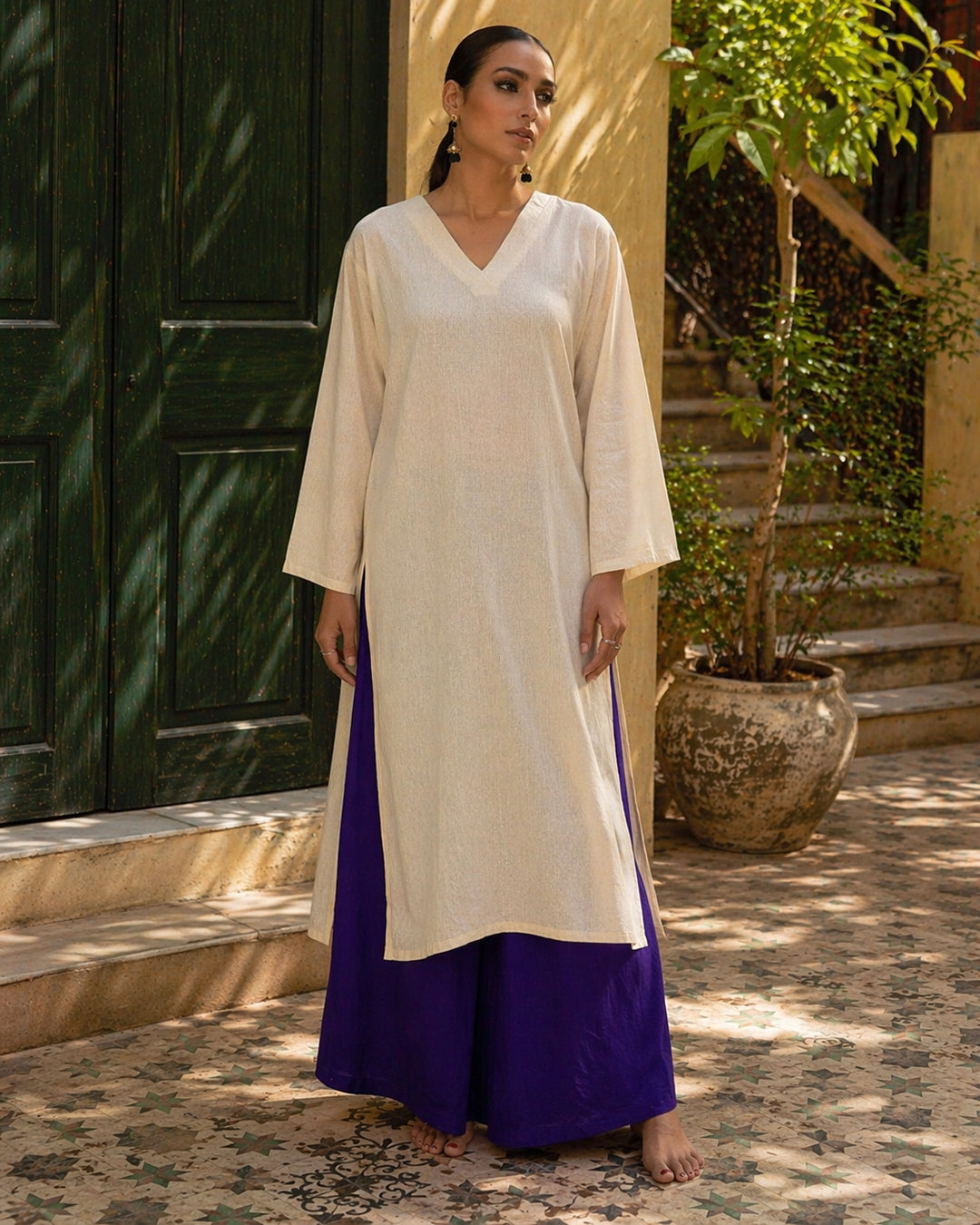 Laalzari ivory linen V-neck kurta and wide-leg palazzo co-ord set for women — front view