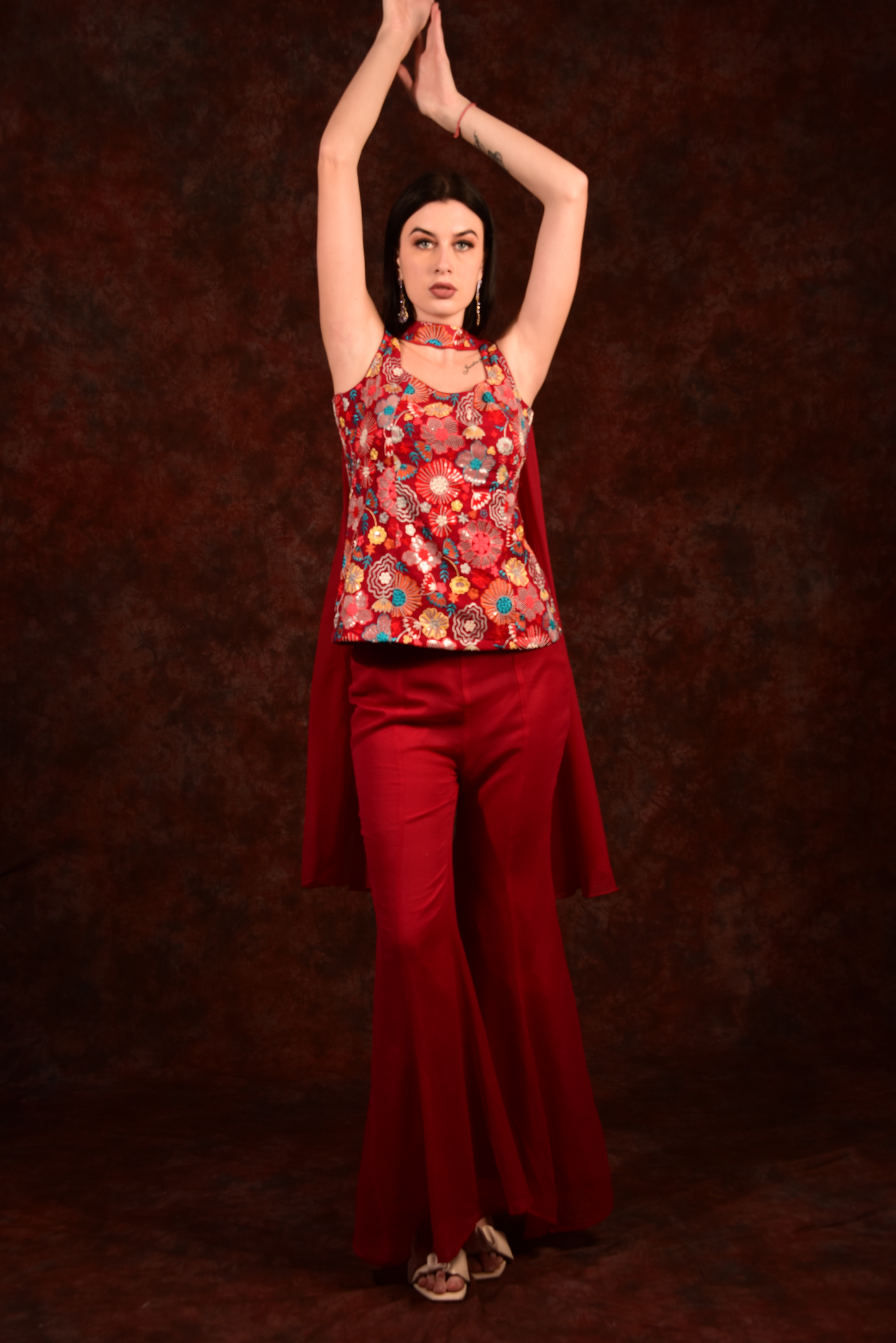 red floral top with bell bottoms