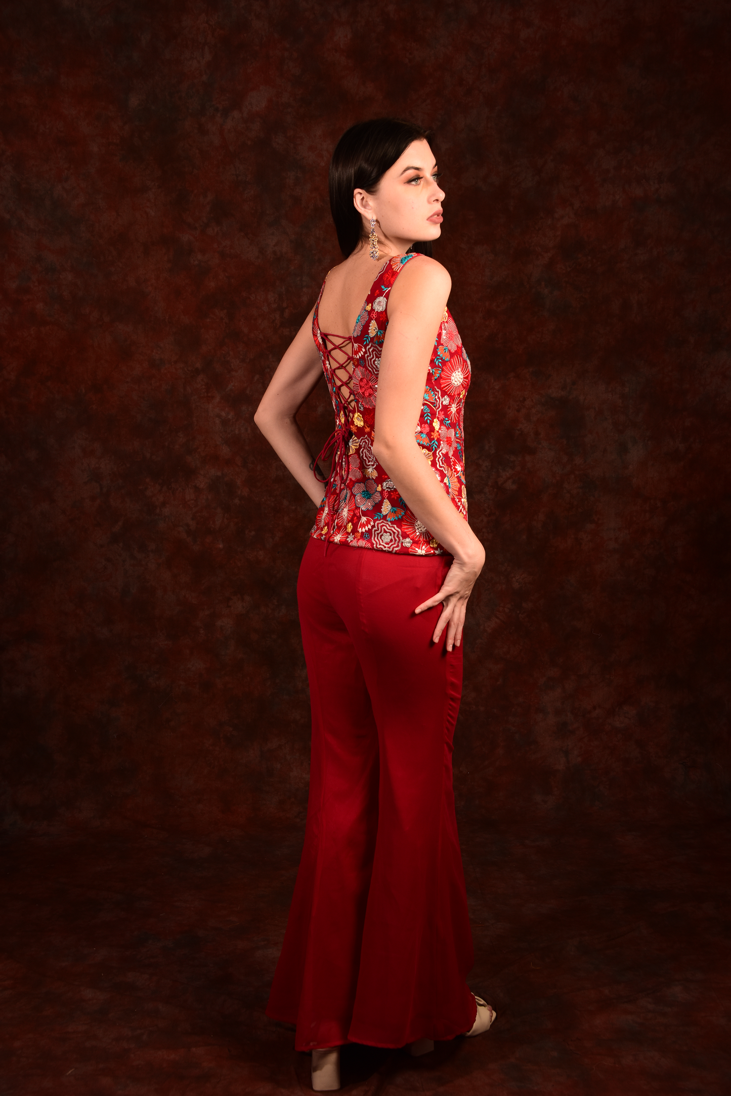 red floral top with bell bottoms