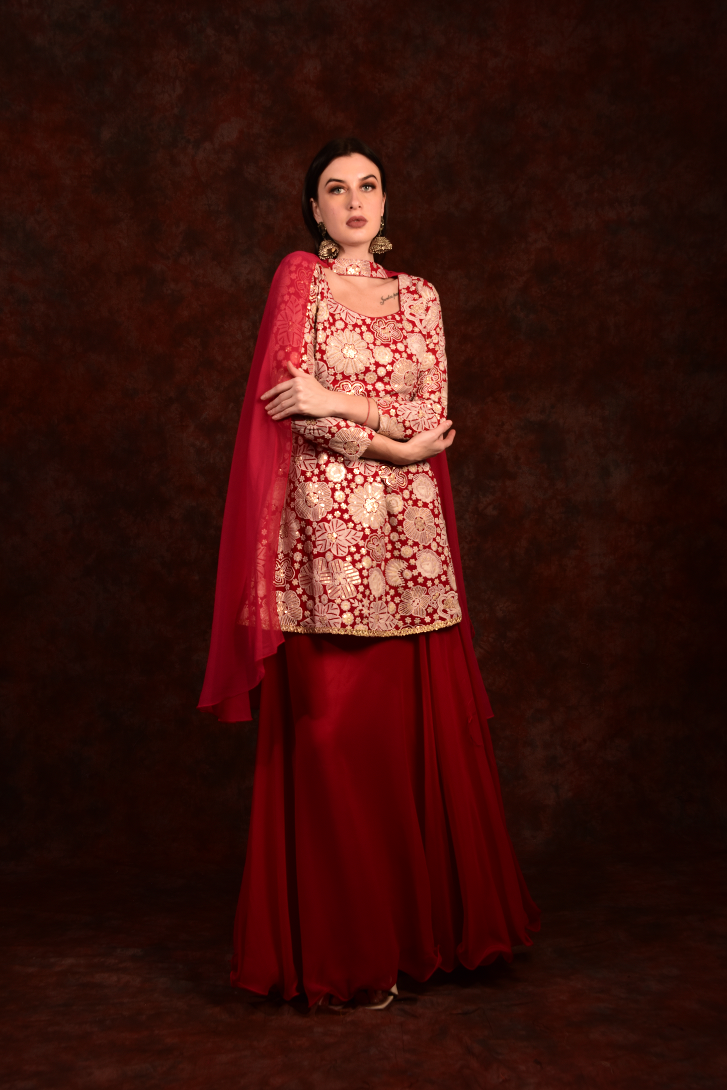Red peplum top with skirt and dupatta