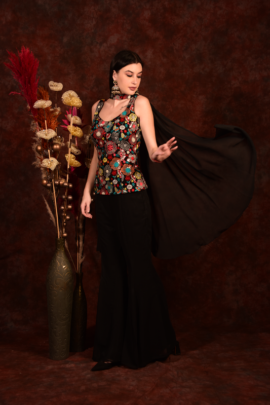 Black floral top with bell bottom pants and dupatta